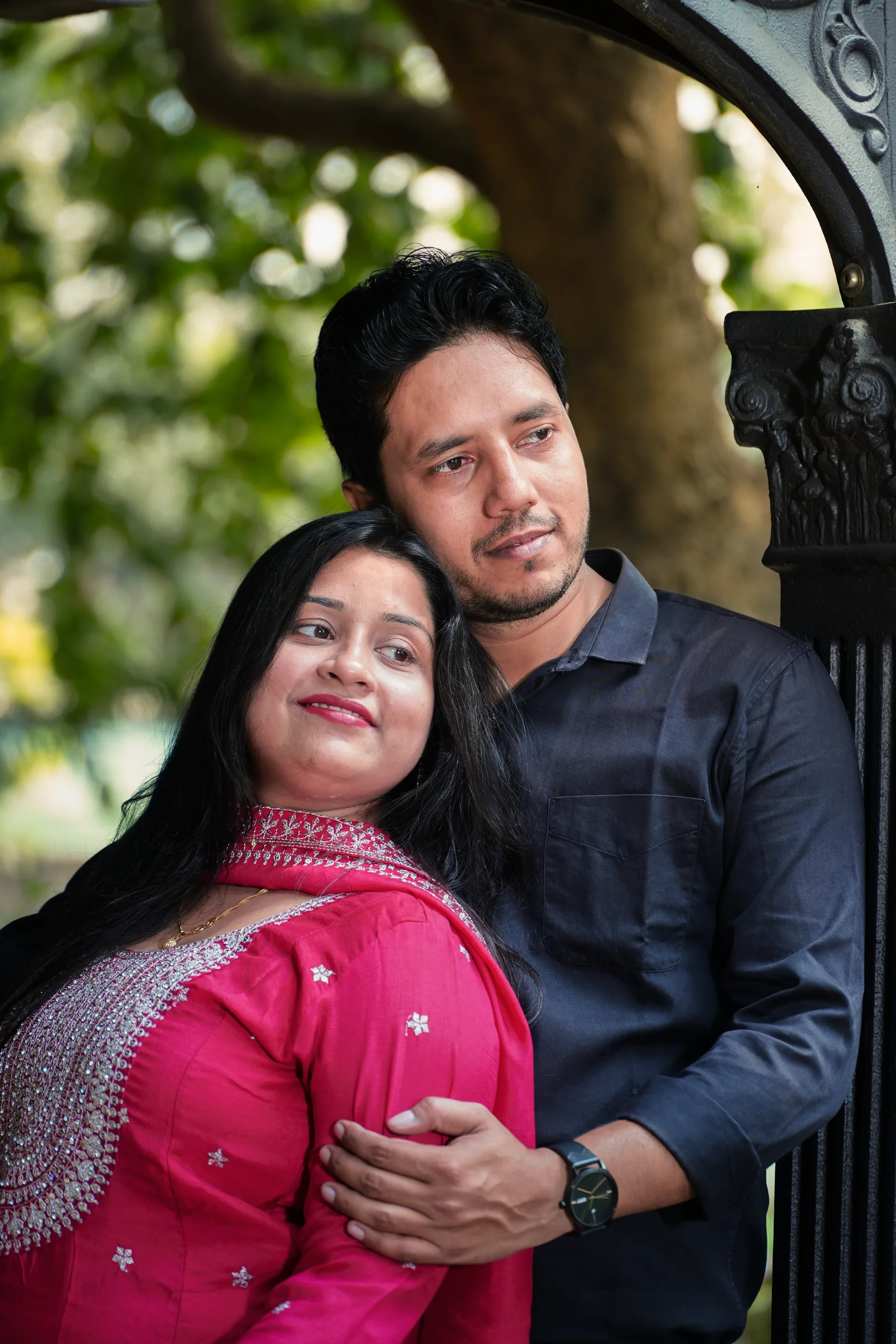 Couple smiling together in a garden
